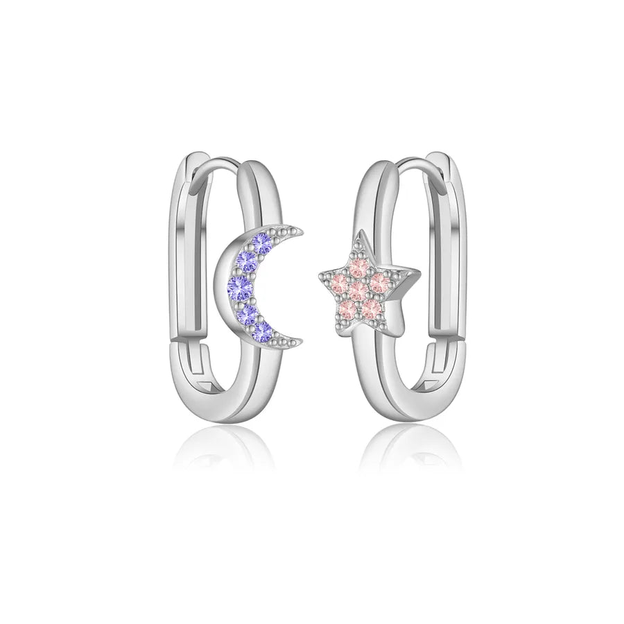 Pair of silver hoop earrings with moon and star designs on a white background