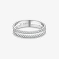 A silver double-row diamond eternity ring with a polished band, featuring a 'S925' sterling silver hallmark inside, set against a clean light gray background.