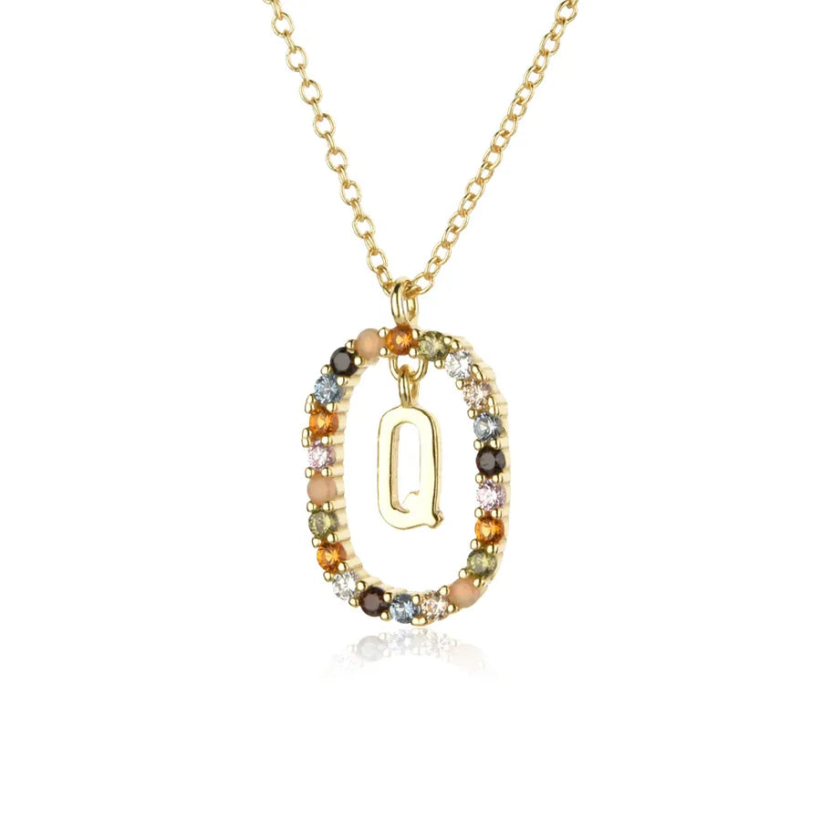 Necklace with a gold pendant featuring multicolored stones on a white background