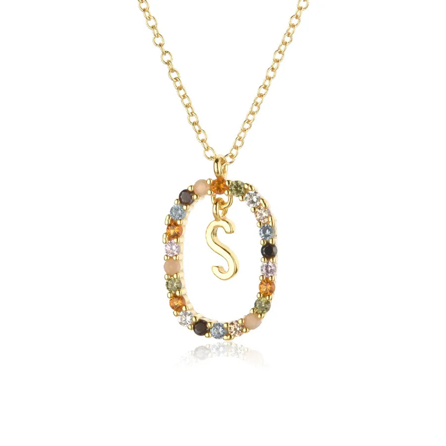 Necklace with a multicolored 'S' pendant on a white background