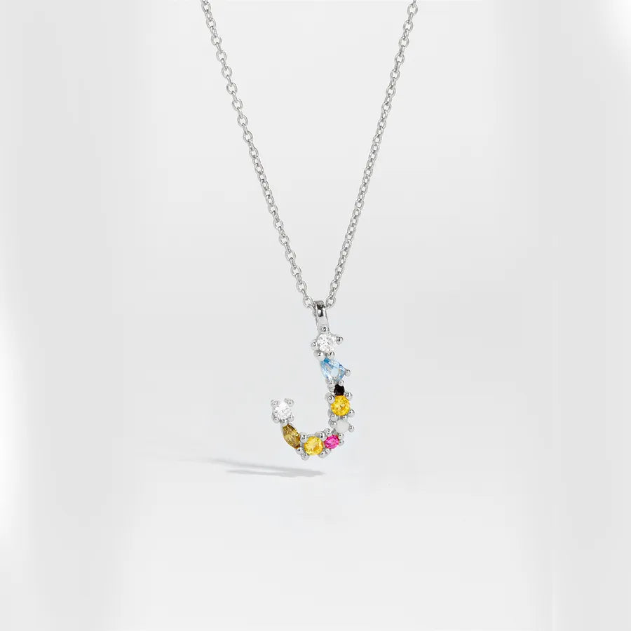 Necklace with a colorful pendant on a white background