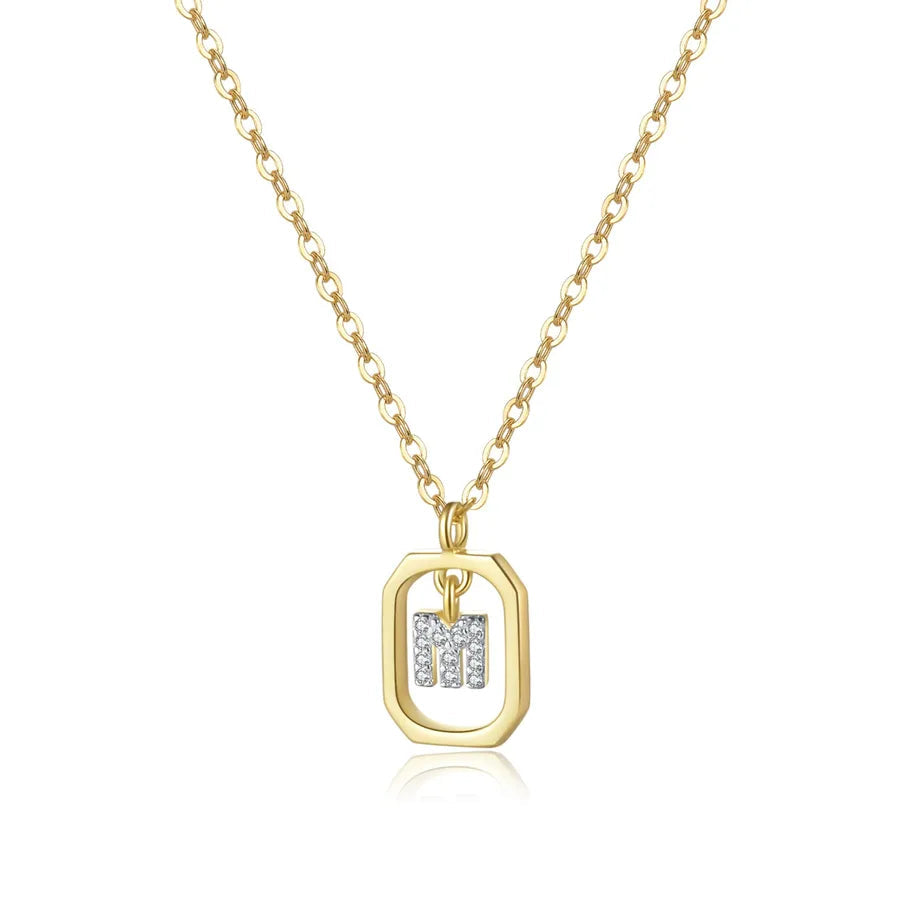 Gold necklace with a pendant on a white background, featuring a '925 Sterling Silver' stamp.