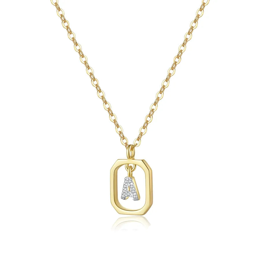 Gold necklace with a pendant on a white background, featuring a '925 Sterling Silver' stamp.